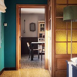 Bright passageway in Au Foyer, vacation home in the Ardennes, overlooking dining area.