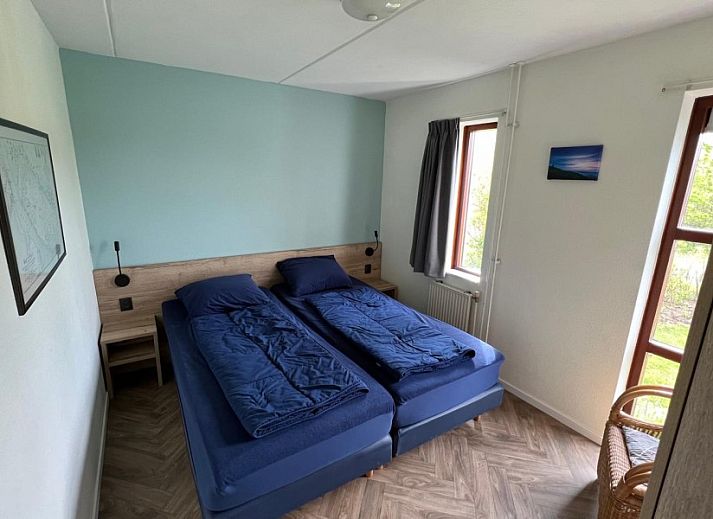 Het Zonneveld vakantiehuis in De Cocksdorp Texel met ruime tuin en groene omgeving.