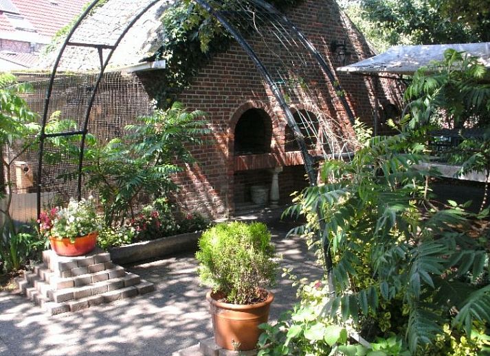 Cozy bedroom in Moerkantheide bed and breakfast, located in Essen, Antwerp, with skylight and soothing atmosphere.