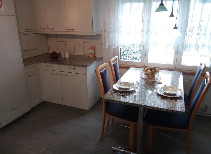 Vakantieverblijf Hauschen in Winikon, Centraal Zwitserland met prachtig uitzicht op groene tuinen.