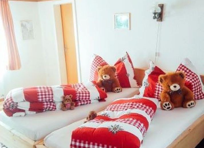 Vakantieverblijf Hauschen in Winikon, Centraal Zwitserland met prachtig uitzicht op groene tuinen.