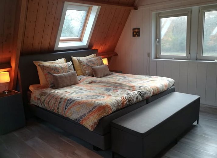 Charmant Vakantiehuisje in Ruigahuizen met bloeiende tuin in de Friese bossen, Friesland.