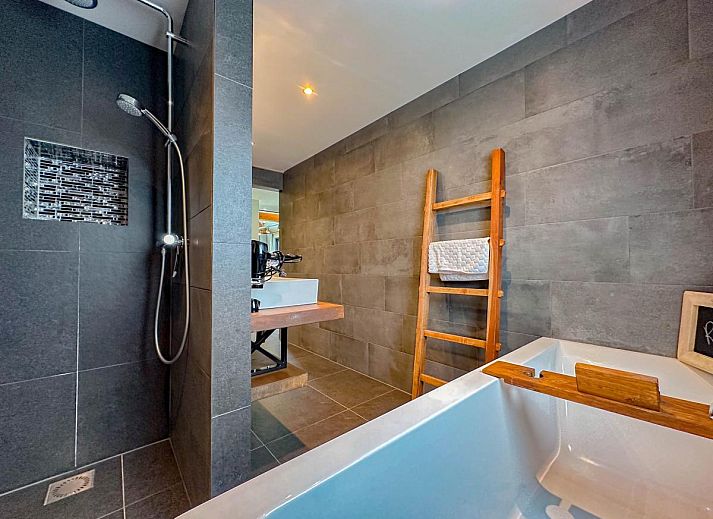 Modern living room in Villa de Argento vacation home, Alphen, North Brabant.