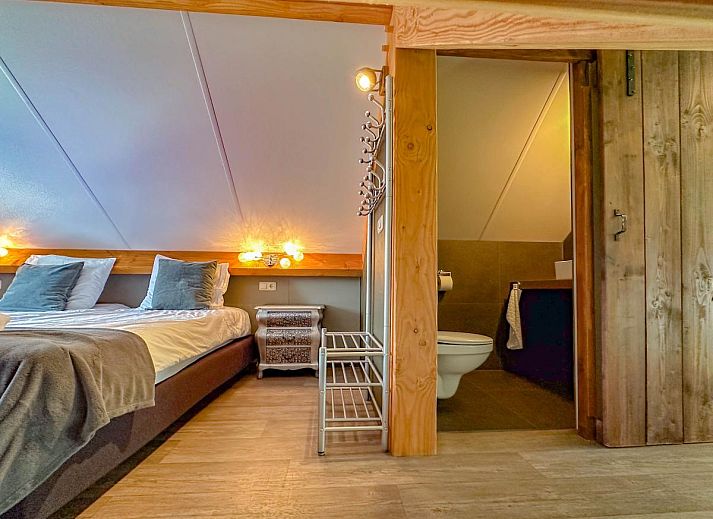 Open kitchen and sitting area in Villa de Argento vacation home, Alphen, North Brabant.