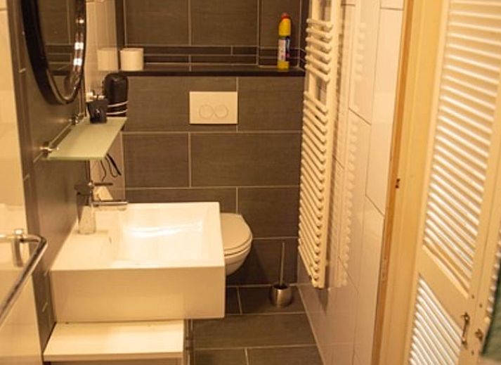 Gezellige woonkamer van Huisje in Landsmeer, vakantiehuis in Amsterdam eo, Noord-Holland met comfortabele zitplaatsen.