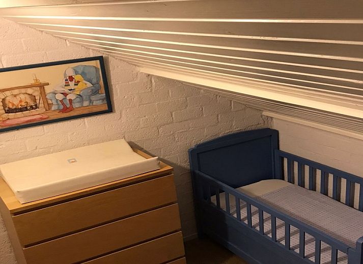 Dining area and stairs in Huisje Blauw, comfortable vacation home in Bruinisse, Schouwen-Duiveland.