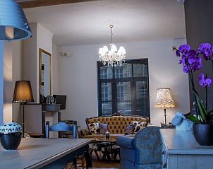 Ruime eetkamer in Huis 7, vakantiehuis Ieper, West-Vlaanderen, met klassieke inrichting.