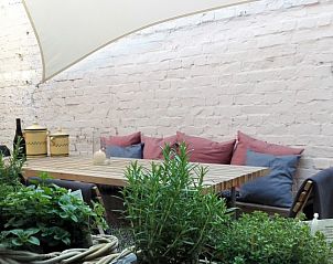 Buitenruimte met zitgedeelte in Huis 7, vakantiehuis Ieper, West-Vlaanderen, Belgi.