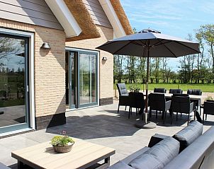 Gezellig terras van 6-8 pers.Wellness Landhuis in De Koog, Texel, vakantiehuis met zitplaatsen.
