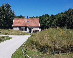 Duinrand Vakantievilla's Type 1 in De Koog, Texel omringd door duinen.