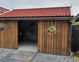 Houten schuurtje bij Duinrand Vakantievilla's Type 1 in De Koog, Texel.