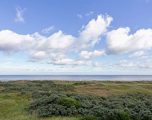 Adembenemend zeezicht vanuit Flat Fleur appartement in De Panne, West-Vlaanderen, omgeven door natuur.