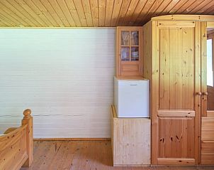 Warme houten inrichting van Vakantiehuisje in Vrees, Duitsland, ideaal voor een ontspannen verblijf in Nedersaksen.