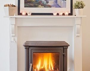 Knusse open haard in Bellovisto vakantiehuis, Vlaamse Ardennen, Oost-Vlaanderen, voor warme avonden.