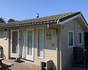 Front view of Chalet No. 12, Midsland North, Terschelling, with inviting entrance and terrace.