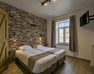 Warandehof vakantiehuis in Gooik, Vlaams-Brabant, Belgi met gezellige slaapkamer en uitzicht.