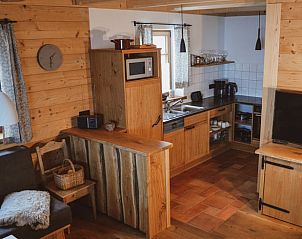 Vacation home in Geiersthal/Altnuberg, Bavaria, offers a warm kitchen with wooden details and modern conveniences.