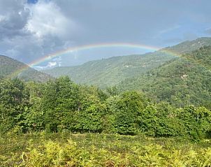 Natuurlijke schoonheid met regenboog bij Huisje in Cassaniouze, vakantieverblijf in Cassaniouze, Auvergne.