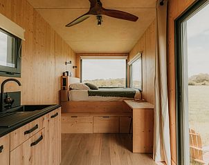 Vakantiehuisje in Pont-l'Abb, Frankrijk, met moderne keuken en rustgevend uitzicht op het omliggende landschap.