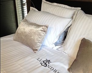 Comfortabele slaapkamer in Lusandre vakantiehuis, Olen, Antwerpen met luxe beddengoed voor een goede nachtrust.