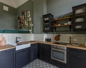 Gezellige keukenhoek in Atelier van Antonine vakantiehuis, Bornem, Antwerpen.