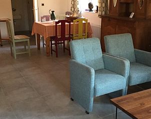 Enjoy the homey atmosphere at the Holiday Home in Anan, with an inviting dining and sitting area.