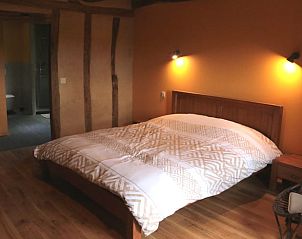Warmes Schlafzimmer im Ferienhaus in Saint-Cirgues, ideal fr einen erholsamen Aufenthalt in den Midi/Pyrenen, Frankreich.