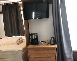 Knusse zithoek in Residence Reine Blanche appartement, Val Thorens, gelegen in de prachtige Rhone-Alphes, Frankrijk.