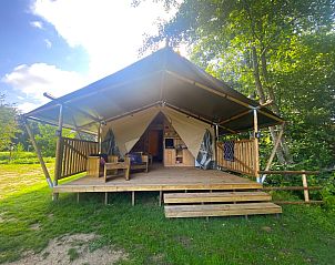 Glamping lodge Safari tent in Poitou-Charentes, enjoy the tranquility of the wooden terrace in nature.