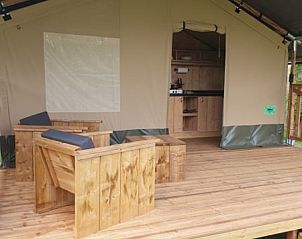 Explore the inviting outdoor space of the Safari Tent in Saulgond, Poitou-Charentes, France, for an unforgettable glamping vacation.