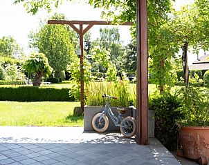 Groene tuin van Het Hemelsveld - Vakantiewoning De Paardenstallen, Alken, Limburg, Belgi.