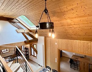 Warme houten zolder in Huisje in LE SAULCY, Le Saulcy, Lotharingen, ideaal voor een knusse vakantie.