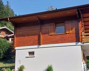 Ervaar de schoonheid van het Vakantiehuisje in GERARDMER, Lotharingen, een sfeervol vakantiehuis omgeven door weelderige natuur.