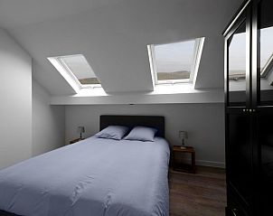 Zolderkamer met dakramen in Mont d'Amis vakantiehuis, Ellezelles, Belgi.