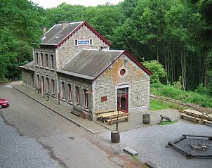 Cottage in Purnode, cottage in the Ardennes, Belgium, surrounded by green nature and rustic charm.
