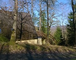 Chalet Dion in Beauraing, Ardennen, met uitzicht op de omliggende natuur en bossen.