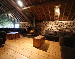 Knusse woonkamer met open haard in vakantiehuis www.ardennenreisje.be, Courtil, Ardennen, voor warme avonden.