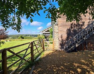 Landelijk uitzicht vanaf het terras van La Terre Ferme vakantiewoning in Houffalize, Ardennen, Belgi.