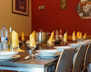 Stylish dining room in Gite Ardennais vacation home, Fraiture, Vielsalm, ideal for cozy dinners in the Ardennes, Luxembourg, Belgium.