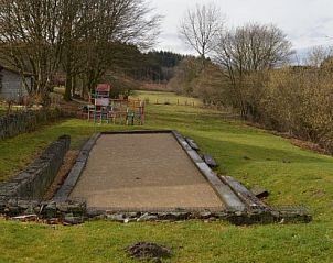 Petanquebaan in de tuin van Maison La Cocotte, vakantiehuis in Baillamont, Ardennen, Belgi.