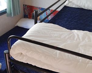 Verblijf in Toscachalets, Viareggio, Toscane en geniet van de comfortabele slaapkamer met stapelbed in dit vakantiehuis.