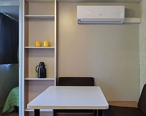 Interieur van het comfortabele familie chalet in Toscane, Itali. Eetgedeelte met airconditioning voor een aangenaam verblijf.