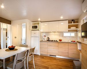 Cozy indoor area with kitchen in Lopar Garden Home vacation home, Lopar, Kvarner, Croatia.
