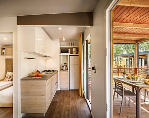 Stylishly furnished kitchen and terrace of vacation home Lopar Garden Home, Lopar, Kvarner, Croatia.