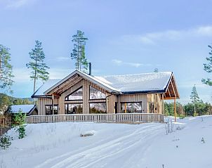 Ontdek het charmante Vakantiehuisje in Vrdal, perfect gelegen in de winterse landschappen van Zuid Noorwegen.