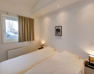 Knusse slaapkamer in La Cabane parterre, vakantiehuis aan zee, Belgische kust, Belgi met zachte bedden.