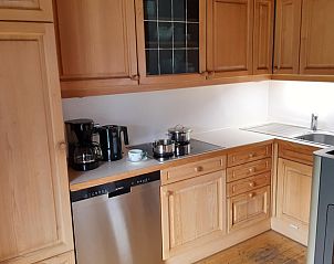 Chalet Helena's keuken in Ktschach-Mauthen, Karinthi. Vakantiehuis met moderne voorzieningen en rustieke charme.