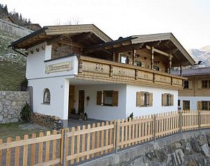 Experience the Alps at Chalet Hainzenberg, a cozy chalet in Zell am Ziller, Tyrol, perfect for a relaxing stay in the mountains.