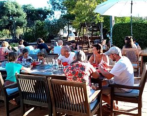 Monte Rosa - Huisje 3 in de Algarve heeft een uitnodigend buitenruimte waar gasten samenkomen in de rust van Baro de So Joo.