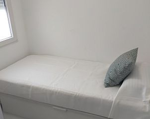 Gezellige slaapkamer in Moderne 3 slaapkamer Salou, strandverblijf in het hart van Costa Dorada, Spanje.